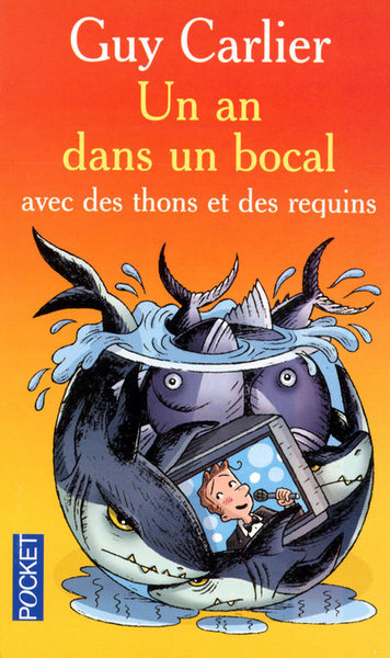 AN DANS UN BOCAL AVEC DES THONS ET DES REQUINS